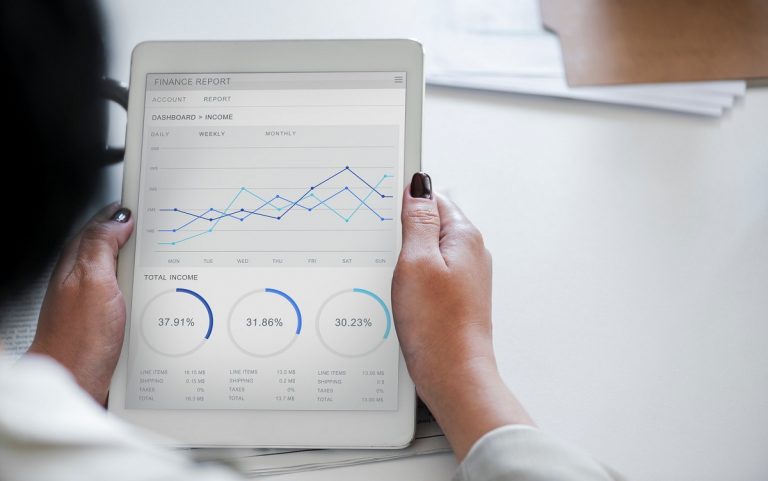 Woman looking at business statistics