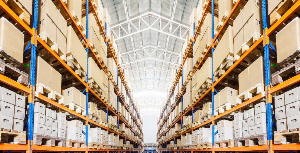Warehouse with stack of cargos