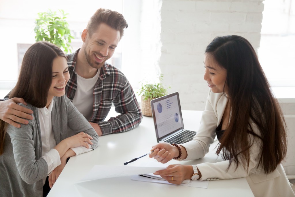 financial consultant advising couple