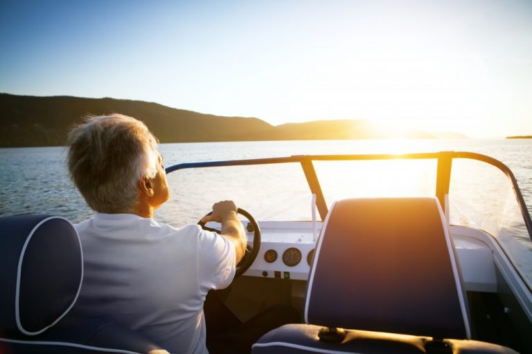 man driving a speedboat
