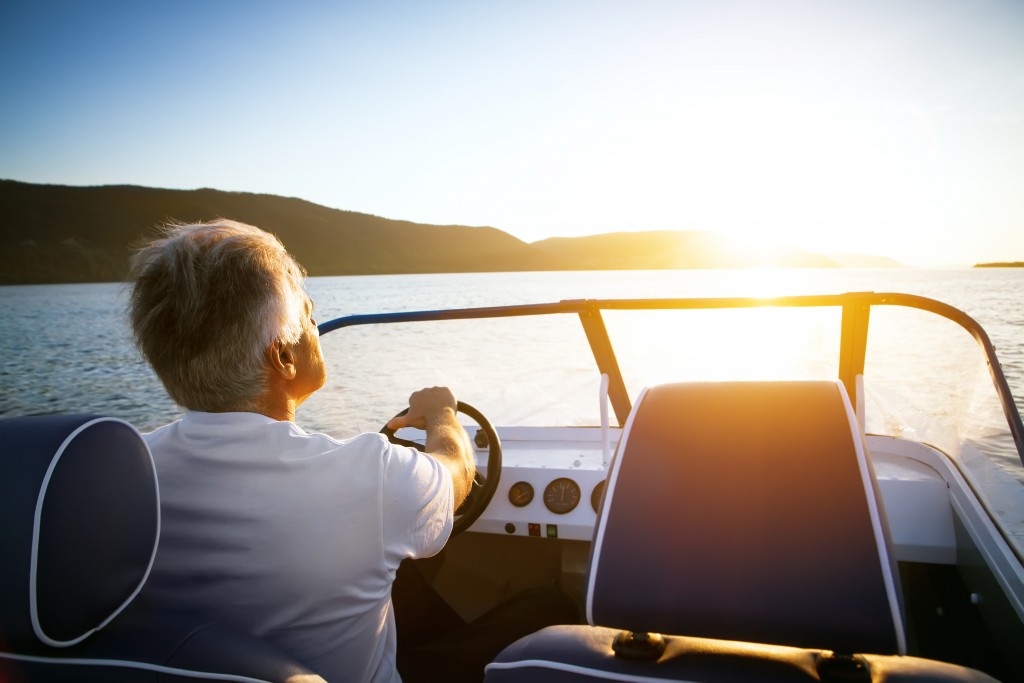 man driving a speedboat