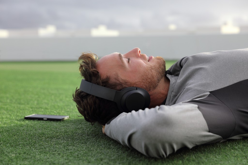 Lying down on the grass outdoors