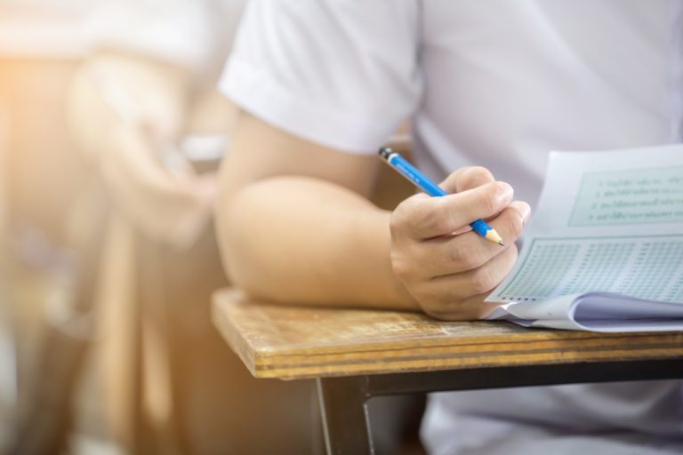 student taking an exam