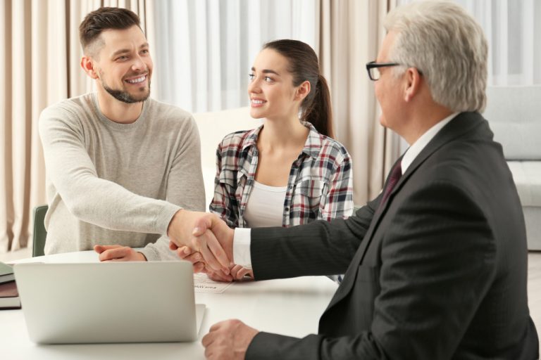 Man shaking hand of lawyer