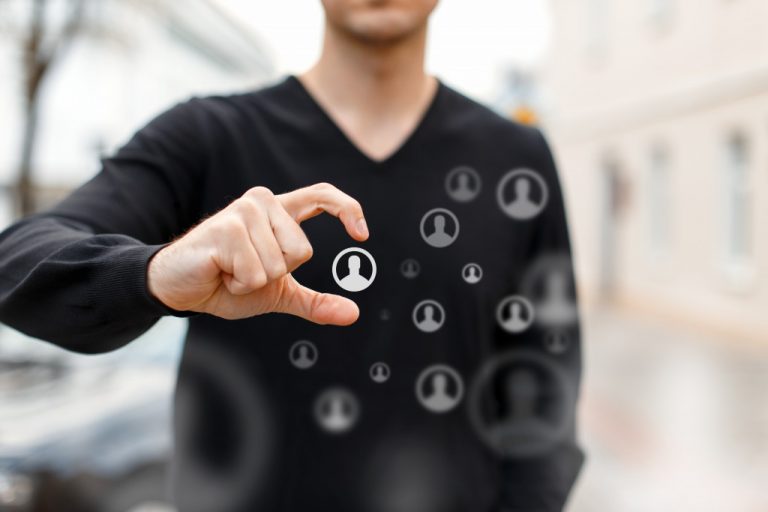a guy touching a hologram
