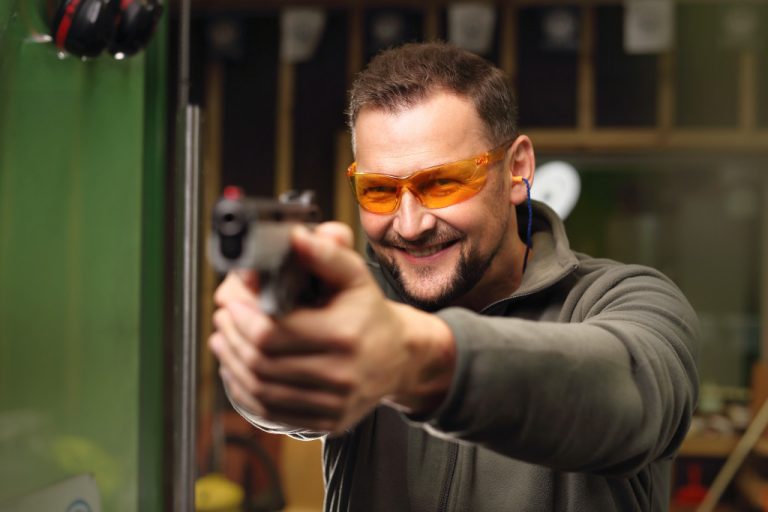 man practicing shooting skills
