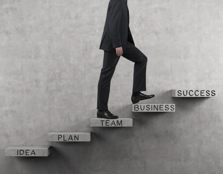 a person climbing a stair to success