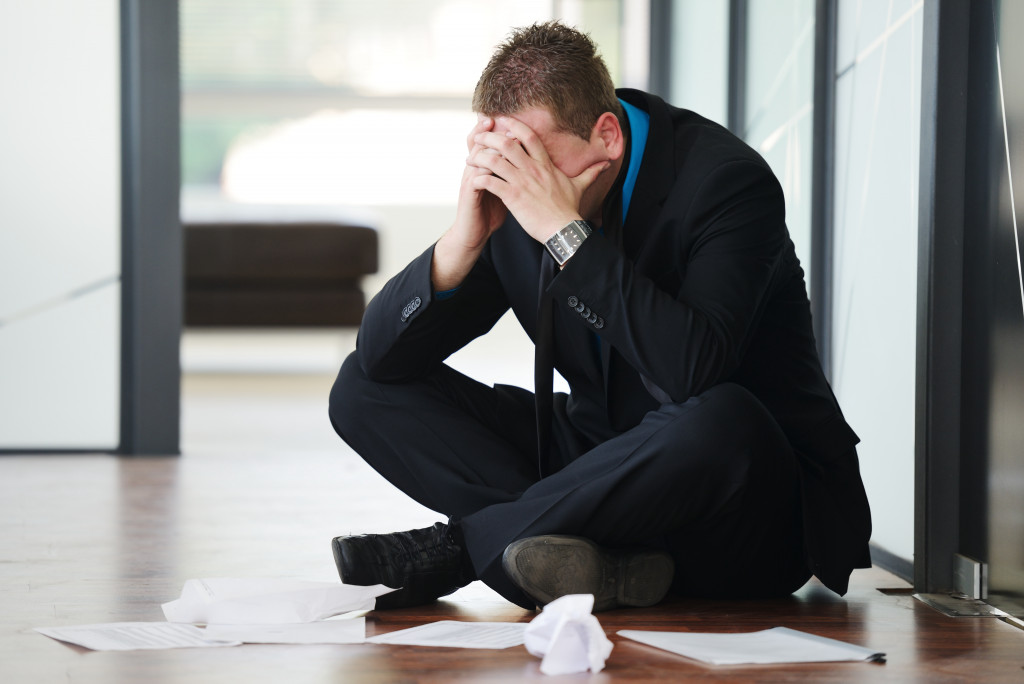A depressed businessman who's afraid of bankruptcy est businessman who's afraid of bankruptcy