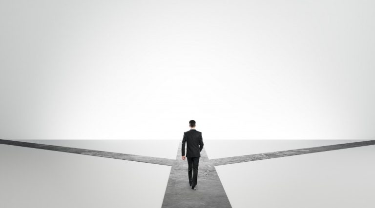 businessman on crossroads