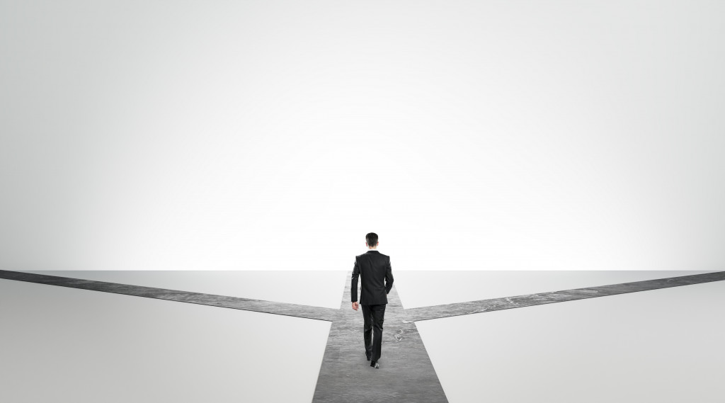 businessman on crossroads