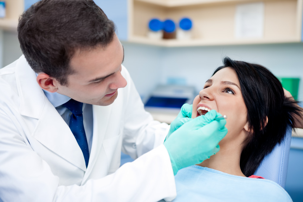 dentist with his patient